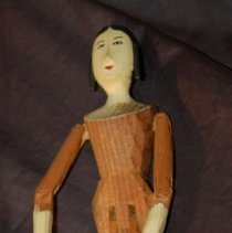 front of doll