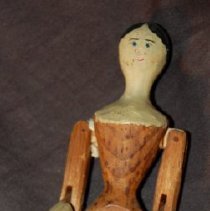 front of doll