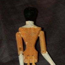 back of doll