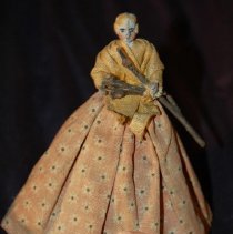 front of doll