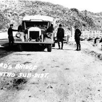 Immigration officers aka Boarder Patrol officers, inspecting a Pacific Grey