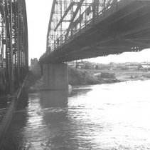 View of the Colorado River and the underside of the Ocean to Ocean bridge i