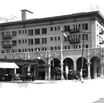 Exterior of the Barbara Worth Hotel before annex. Shell Service Station on
