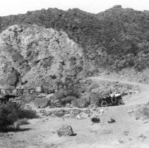 Car driving down Mt. Springs Grade.