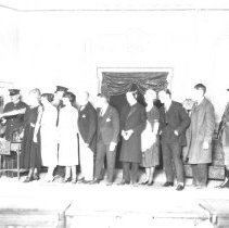 Group of "actors" on a stage. Elks Club Rally, production of play titled "S