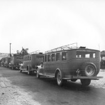 Borderland Transit Co. - Mack buses at Grey's Well in desert. Small car fac