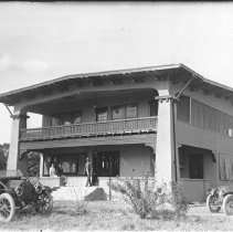 Two-story house, large porch both upstairs & downstairs owned by Ben Hulse