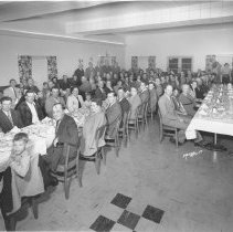 Holtville Motor Inn. A large group of men and women at banquet tables.