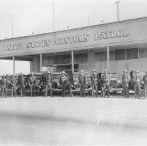 Group of men in front of the U.S. Customs Patrol building in Heber.
