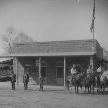 U.S. and Mexico Officers in front of the U.S. Customs house / office buildi