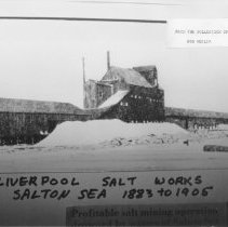 New Liverpool Salt Works. Building with pile of salt next to it.