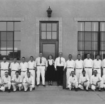 Employees of Cramer Baking Co. lined up in front of building.
