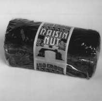 Loaf of Cramer's Log Cabin Raisin Nut bread.