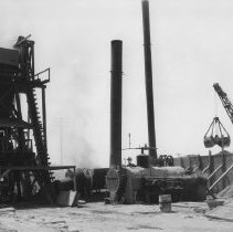 Batch Plant for paving highway in sand dunes.