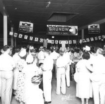 Crowd of people gathered at the Whiting - Mead store