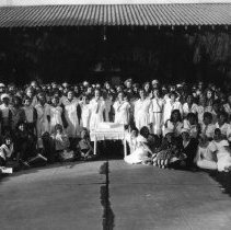 Large group of Girl Scouts in front of Wilson School.