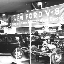 Edgar Bros. Co. - Fair display showing new Ford V-8 cars.