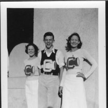 Central High School cheer squad. Two girls and one boy.