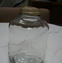Glass jar for Iris Coffee with twist on / off lid.
