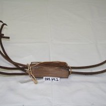 Set of wooden and metal detachable harvesting crate handles.