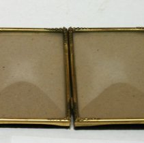 Fold out / double picture frame with bubble / convex curved glass.