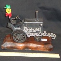 Metal "folk art" tractor, with Danny Danenberg's name on it,