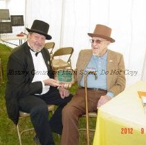 Bruce Dart presents Chester Bailey with lifetime Citizen Award
