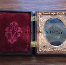 Ambrotype of Celia Omira Rumseyin case with gold embossed frame
