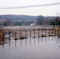 Bars to hold back trash