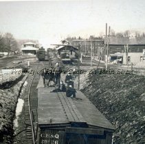 Boys on Train Car. Mansfield Station in background.