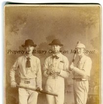 Three unidentified baseball players