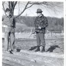 James Asher McConnell & Joe McConnell with logs.