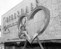 Model Poses Inside Hillsdale Shopping Center Heart, 1960
