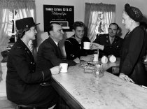 Bill Kyne Has Coffee with Soldiers at the Three Cities USO Canteen in San M