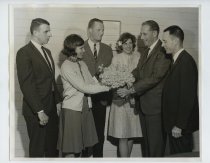 Untitled [Presenting a Bouquet to Roy Archibald], April 7 ,1955.