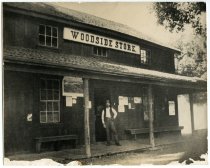 Untitled [Man Posing in front of Woodside Store], n.d.