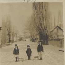 sleding three children