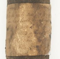 Historic specimen label adhered to Limonite, 8138. (illegible)