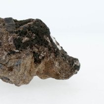 Corundum, 7400. Right view with scale bar.