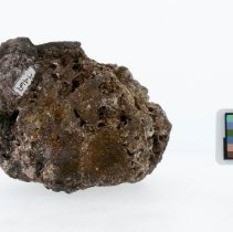 Corundum, 7469. Left view with scale bar.