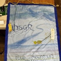 A dark and light blue banner with dark blue being the border. The banner h