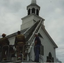 ladder truck securing loose steeple trim