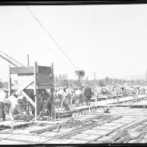 Alexander Hamiton High School, Culver City, Loading Concrete from Chute into Two-wheeled Dumps, School Bond Issue, March 1931