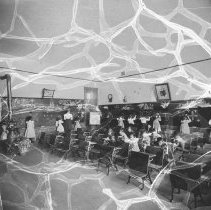 First grade activities, Ann Street School. [Circa 1891.  Students drawing on blackboard, chalkboard]