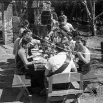 King junior high school activities.  Democratic principals are applied in the realization of a recreation center.  Sharing by fellow pupils and the community; Enjoying the meal.