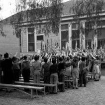 32nd street school activities.  Beginning an outdoor assembly with a salute to our flag.