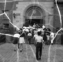 32nd street school activities.  Children entering school.
