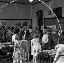 32nd street school activities.  Saluting the flag.