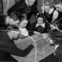 Washington high school activities.  Discussion group [reading a map of the United States].