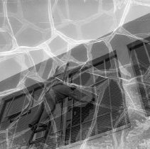 Emerson junior high school activities.  Informal shots.  Custodian washing windows.